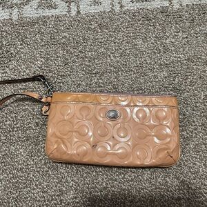 COACH Pink Embossed Signature Patent Wristlet